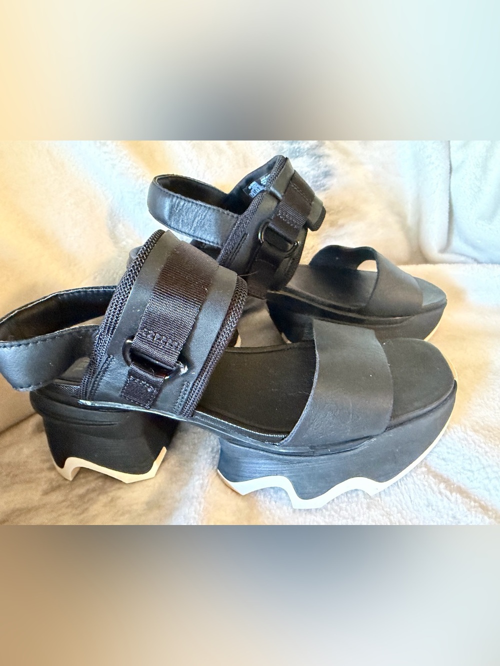 Sorel Black Platform Sandals with Chunky Wavy Sole